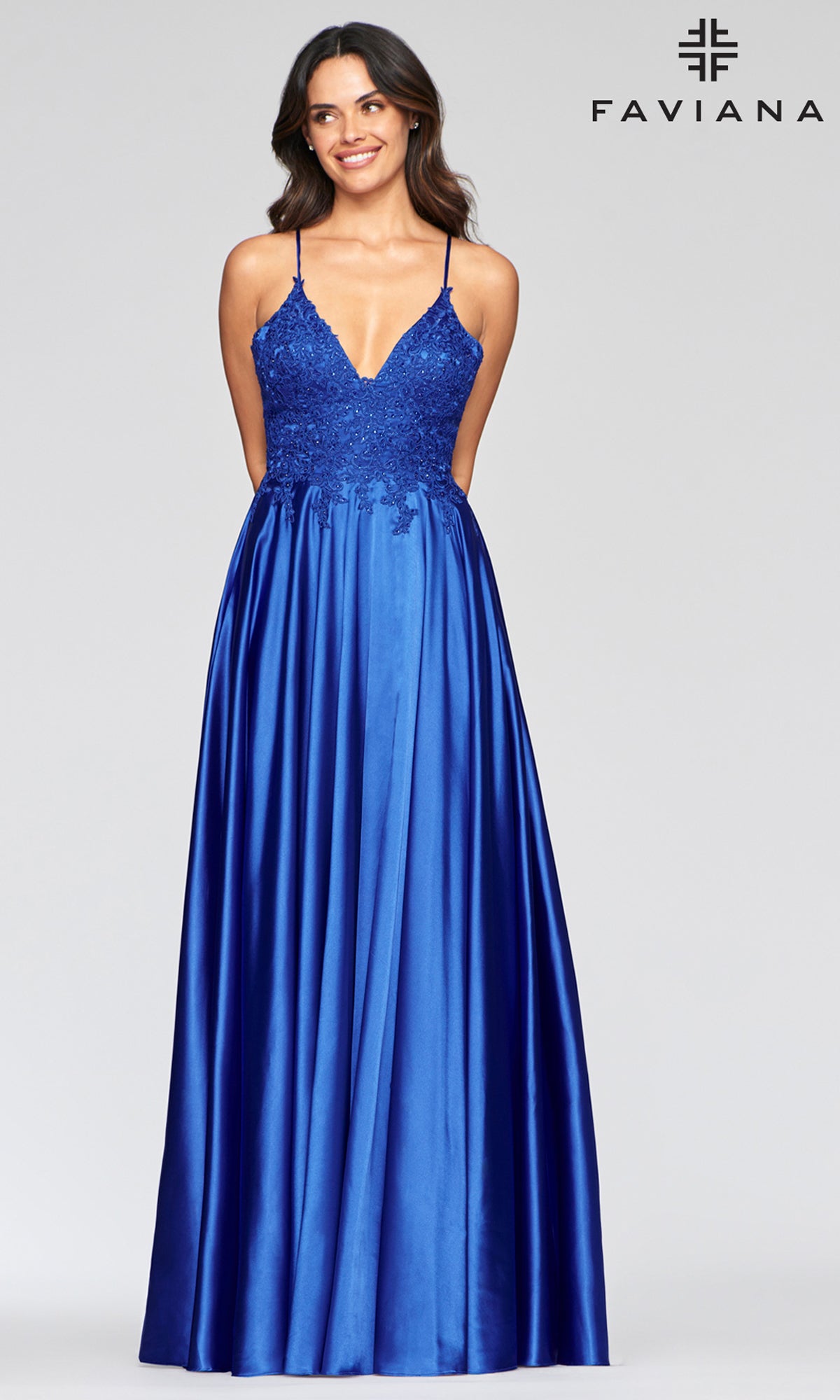 A woman in a Faviana Lace-Bodice Long A-Line Prom Dress.